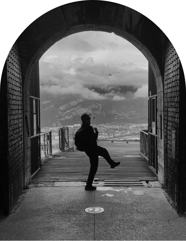 Image showing a person with the scenic background of Grenoble